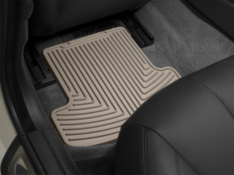 WeatherTech 07+ Nissan Versa Rear Rubber Mats - Tan