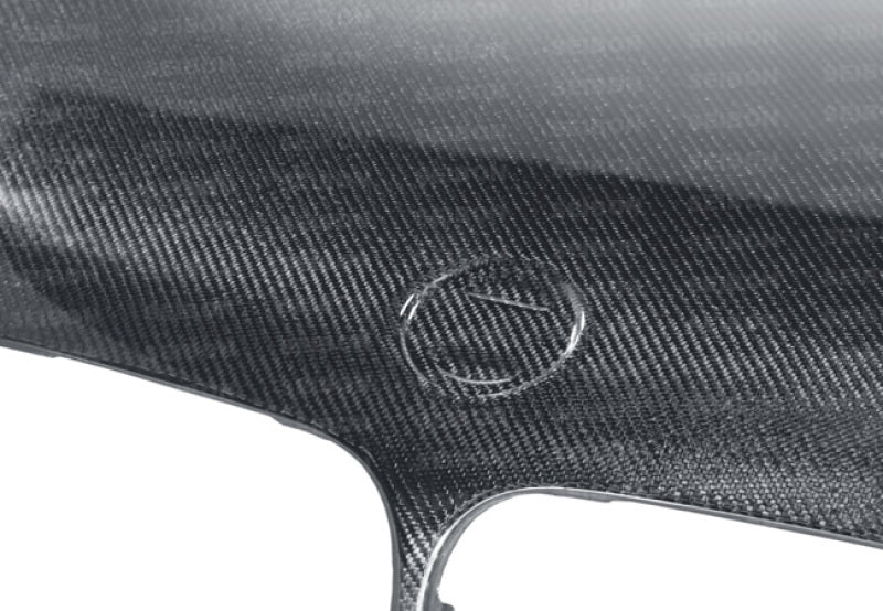 Seibon 02-05 BMW 3 Series 4dr E46 (Manuf Date 7/02-7/06 Models Only) OEM-Style Carbon Fiber Hood