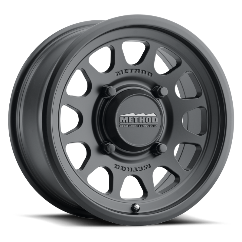 Method MR414 Bead Grip 15x10 / 6+4/25mm Offset / 4x136 / 106mm CB Matte Black Wheel