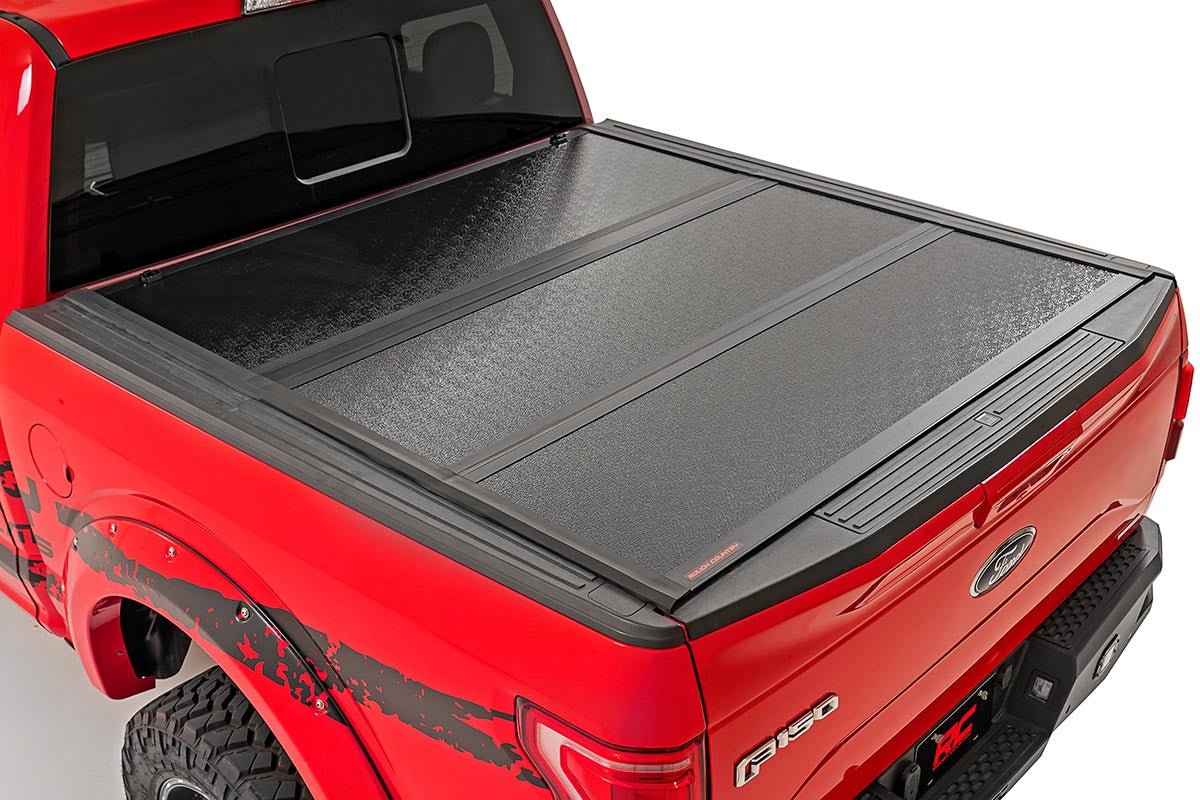 Rough Country 47220550A Low Profile Tri Fold Aluminum Tonneau Cover for 2015-2020 Ford Raptor (5' 7" Bed)