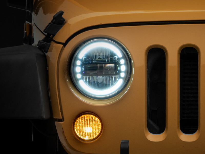 Raxiom 97-18 Jeep Wrangler TJ/JK Axial 7-Inch LED Headlights w/ DRL- Black Housing (Clear Lens)