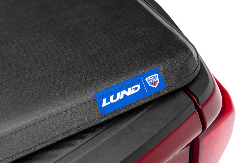 Lund 09-14 Ford F-150 Styleside (8ft. Bed) Hard Fold Tonneau Cover - Black