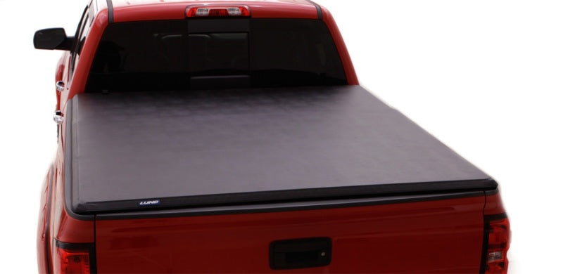 Lund 05-10 Dodge Dakota Fleetside (5.3ft. Bed) Hard Fold Tonneau Cover - Black